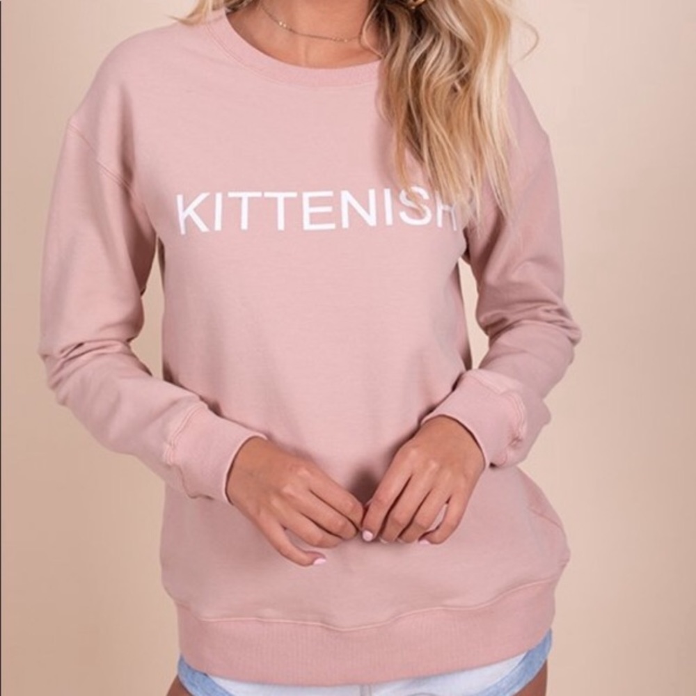 ISO kittenish pink sweater size Medium 💗